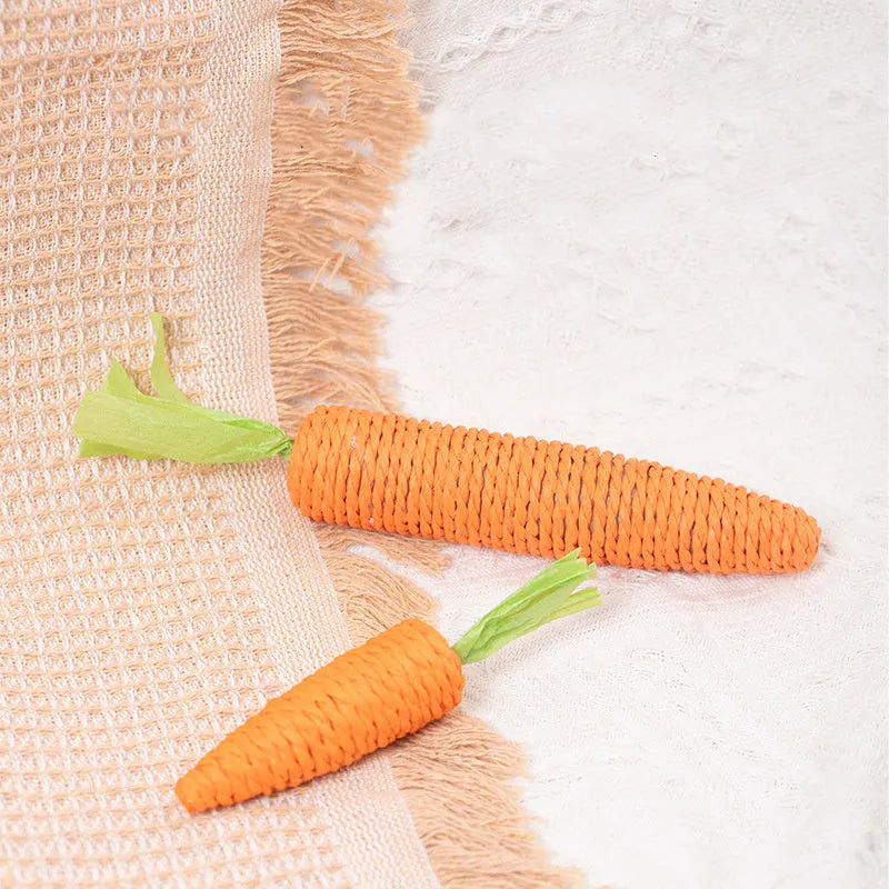 Interactive cat toy set with carrot paper toys, ringing stones, and textured grinding sticks for indoor play