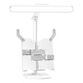 Adjustable multifunctional table lamp with a reading light on a bookshelf, showing dual power and colour temperature controls.