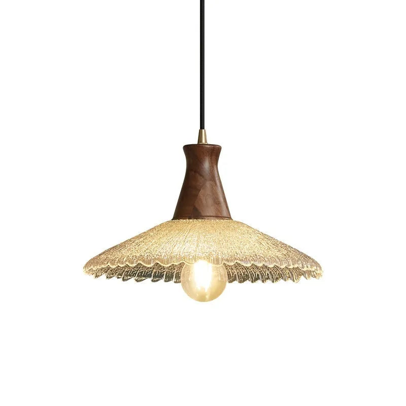 Retro-style brass and glass chandelier with a wooden frame hanging from a ceiling.
