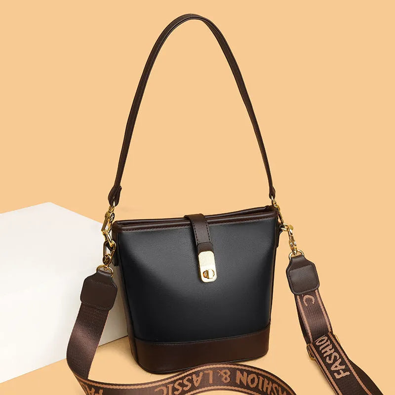 Korean style black bucket messenger bag with double shoulder straps and internal organisation pockets