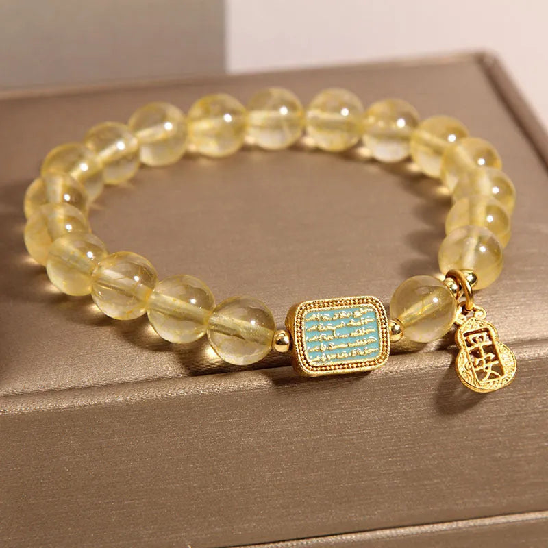 Women's natural yellow crystal bracelet with citrine colour and rhinestone detailing