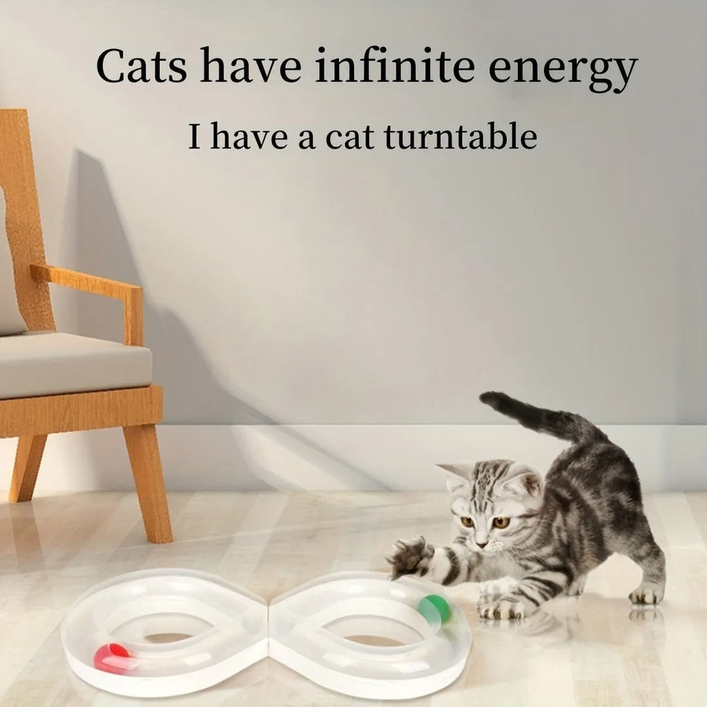 Blue and white cat interactive toy with turntable track ball and teasing stick on flat surface