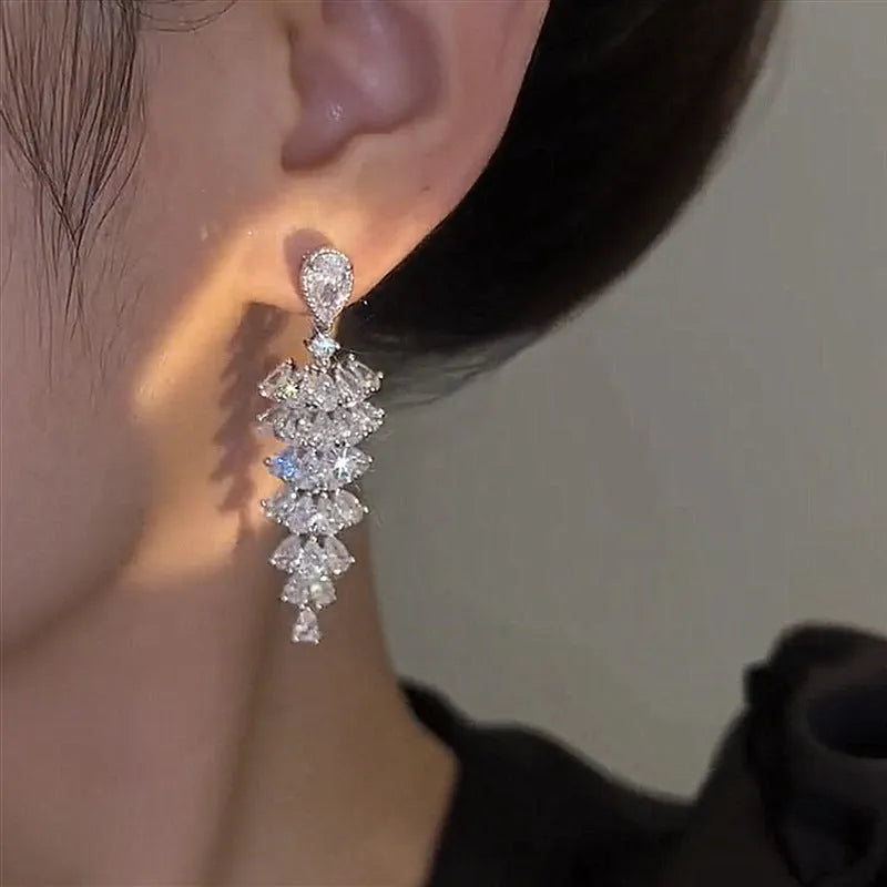 Silver pagoda Christmas tree drop earrings with sparkling zircon crystals on copper stud fittings