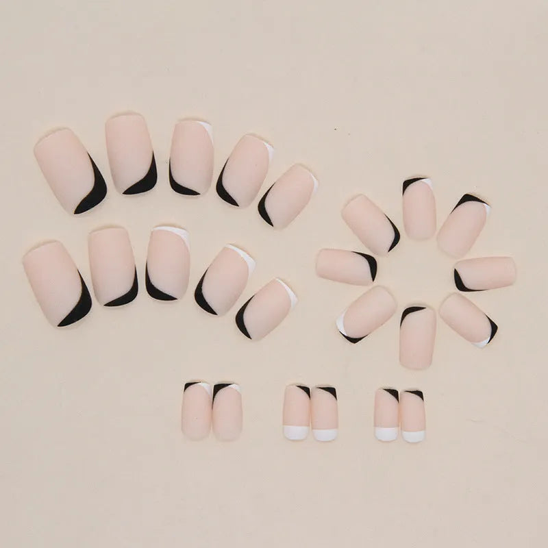 Black and white frosted press-on nail decorations with French style design