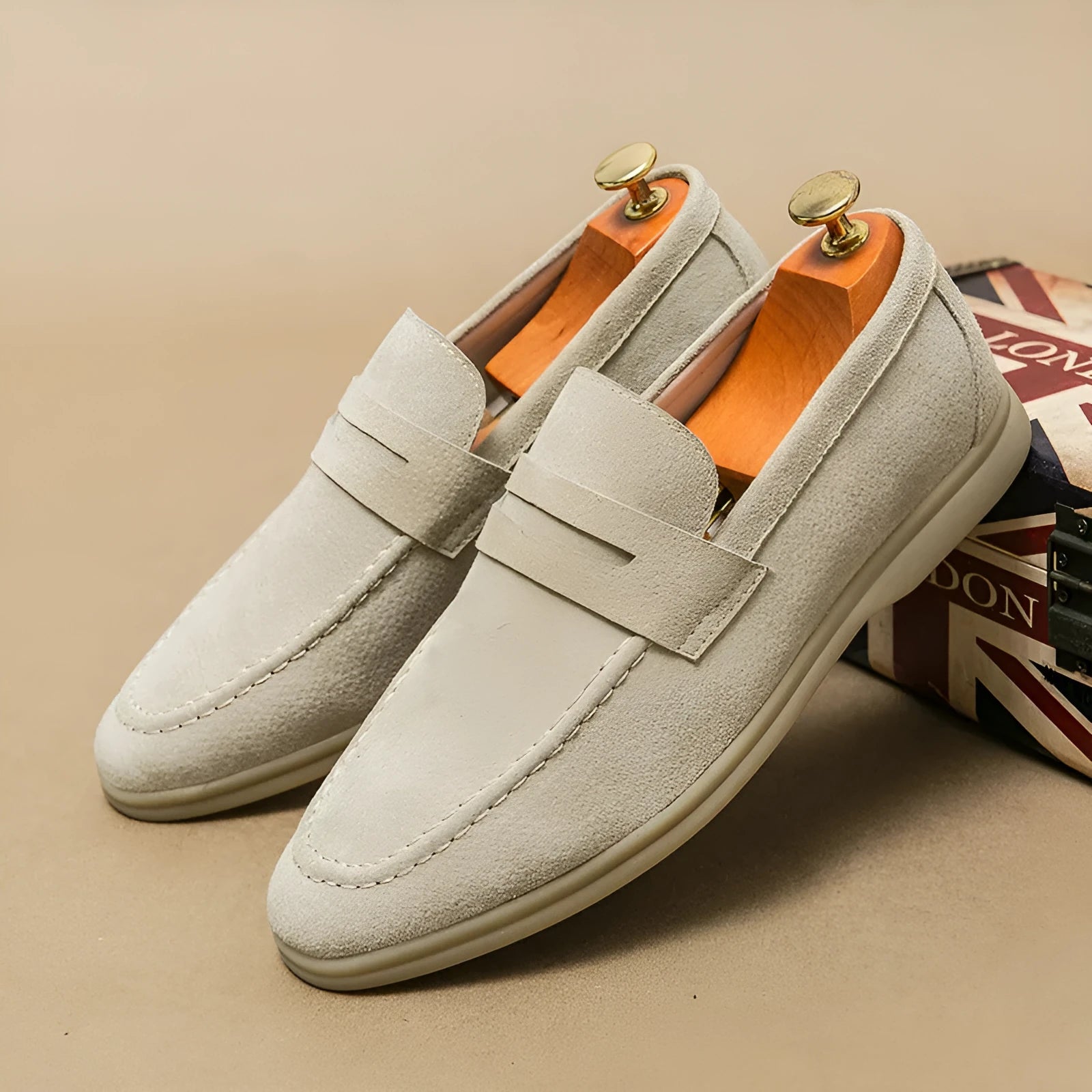 Men's slip-on leather casual shoes in black with round toe and rubber sole
