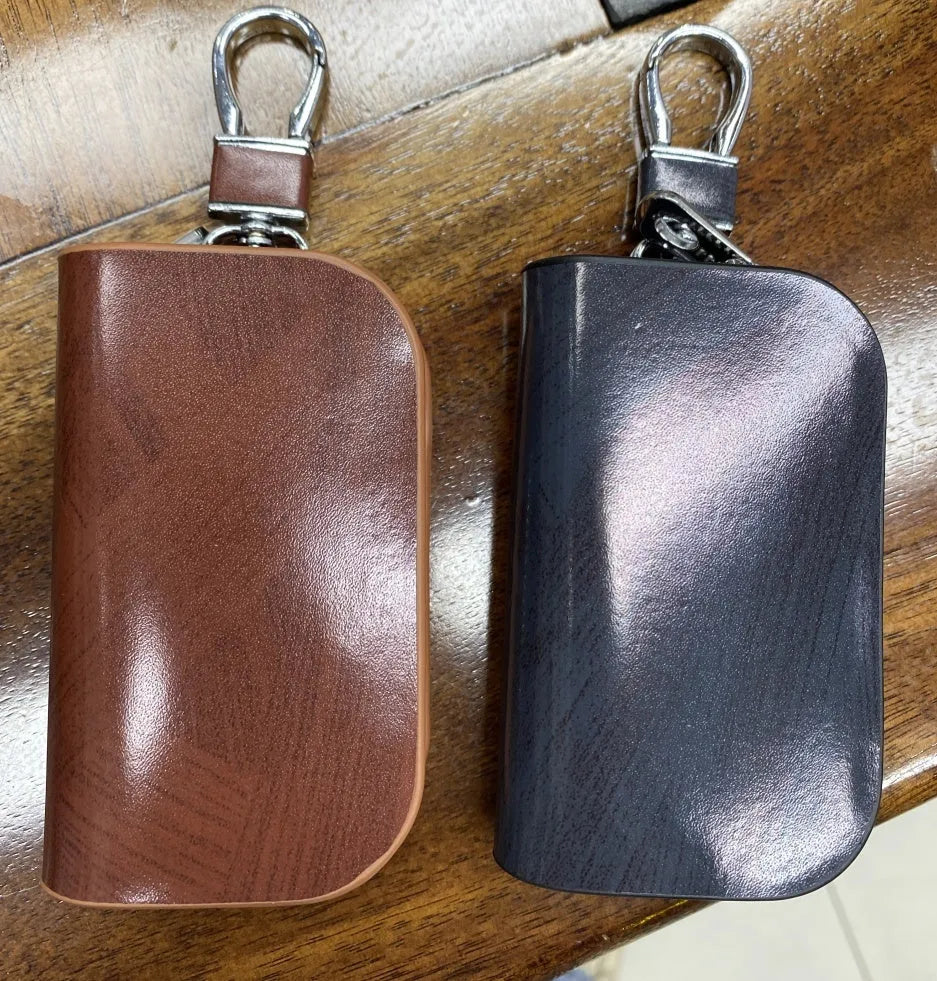 Genuine leather car key case with zipper in black and brown frosted finish