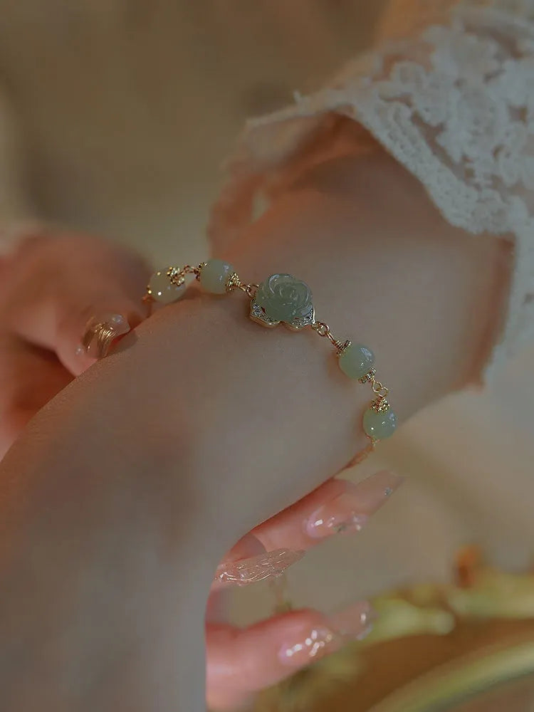 Women's floral bracelet in Hetian Jade Rose with 14K gold gilding and manual craftsmanship.