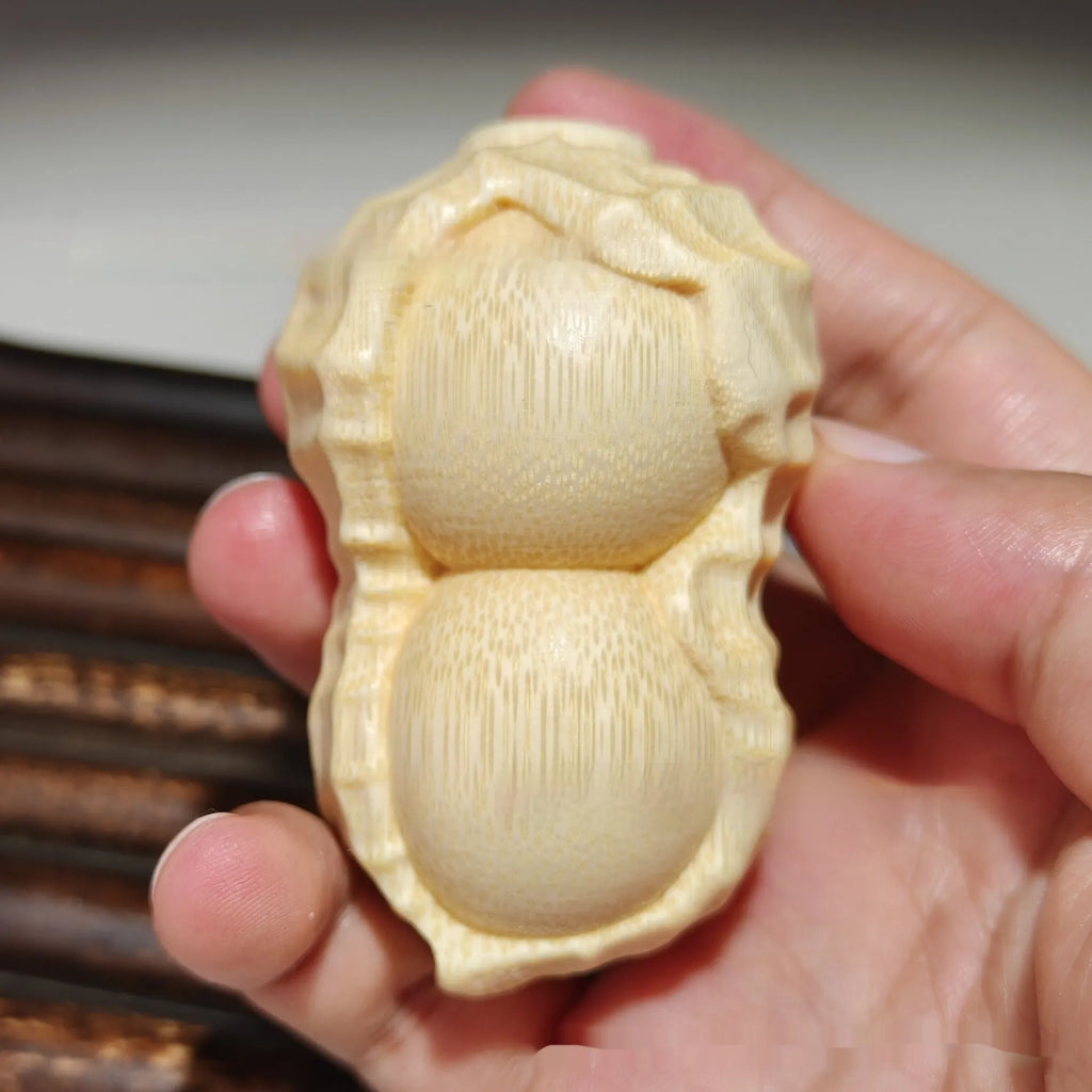 Natural bamboo carving peanut ornament with Good Things May Happen inscription