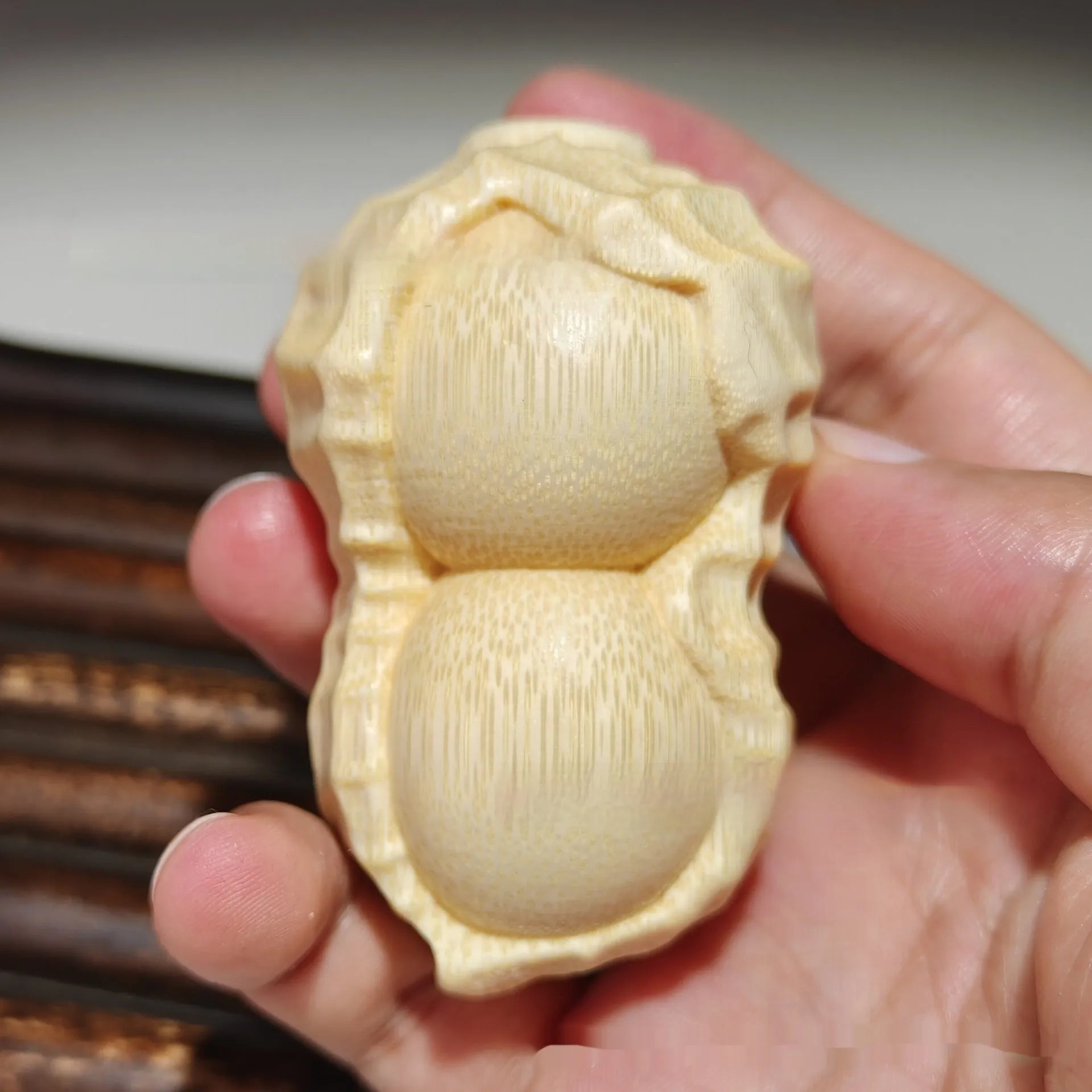Natural bamboo carving peanut ornament with Good Things May Happen inscription