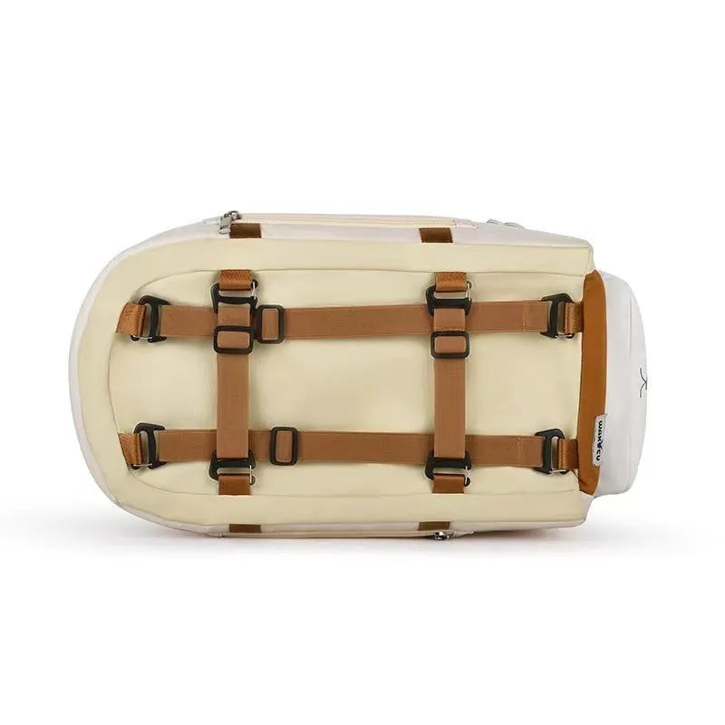 Beige hard-shell pet flight case with one-shoulder strap for cats and small dogs