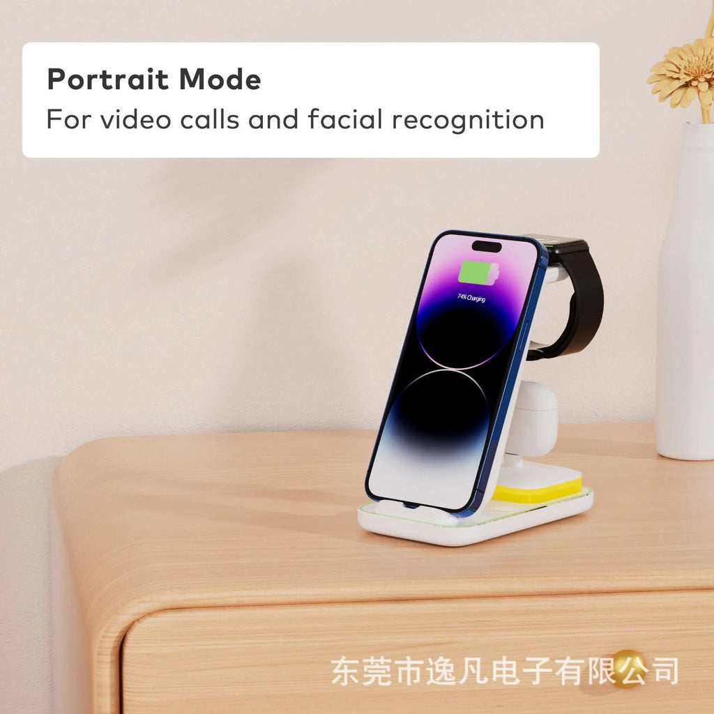 Black vertical wireless charging stand holding a mobile phone, smartwatch, and earbuds.