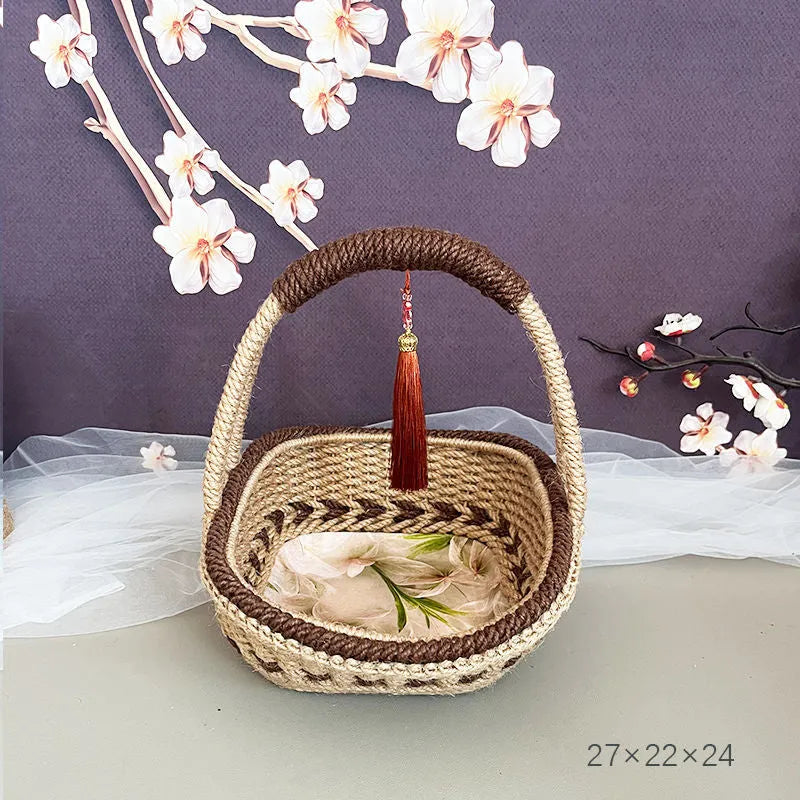 Coffee brown hand-woven straw basket with hemp rope detailing.