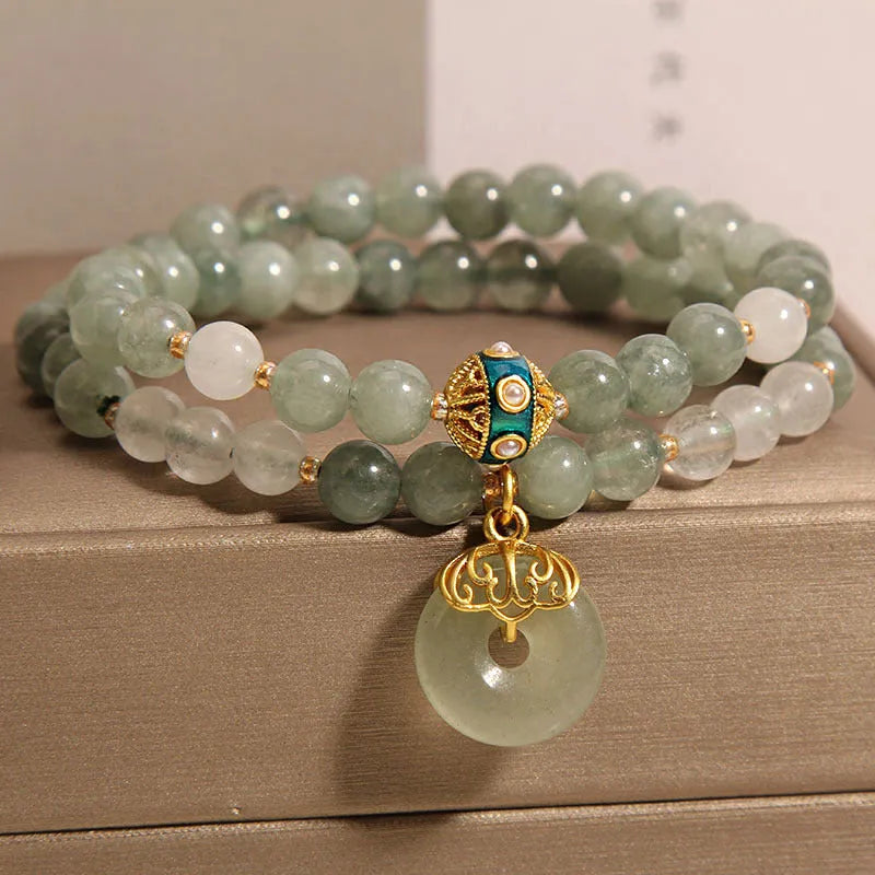 Aventurine double-layer jade bracelet with rhinestone accents and peace buckle closure in emerald green
