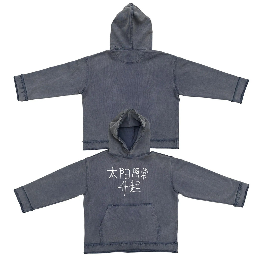 Dark blue hooded sweater with 'The Sun Also Rises' text printed on the back.