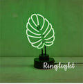 White minimalist bamboo-shaped desk lamp with green light, USB cable, shown in two size options.
