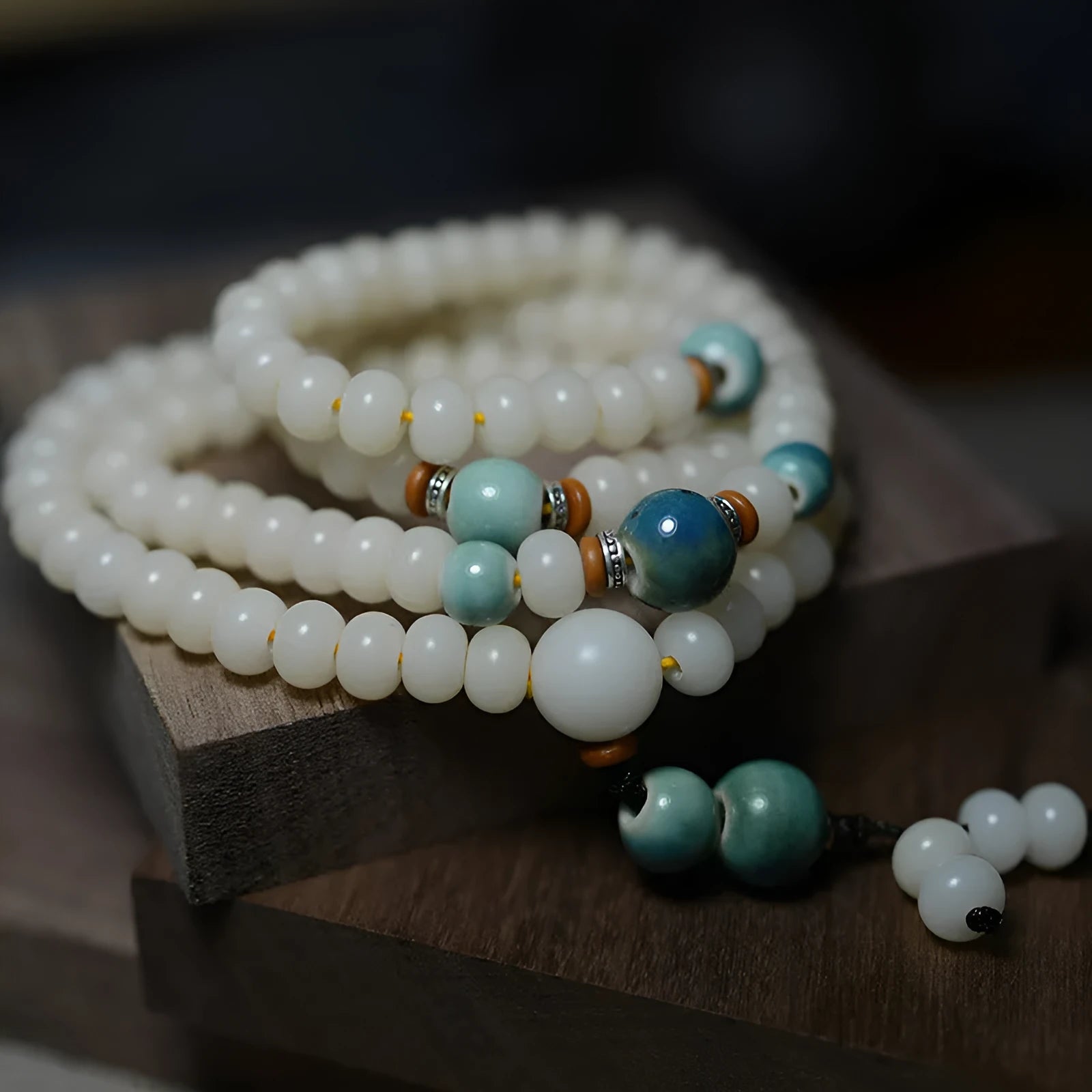White bodhi seed bracelet with 108 flat round beads in two sizes
