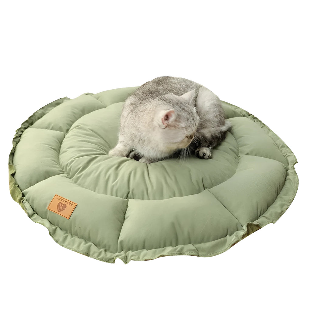 Grey and green reversible donut pet bed for cats and small dogs showing dual-sided design