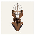Gold handmade halter one-piece swimsuit with hollow-out design on mannequin