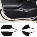 Four carbon fibre protective film pieces for Tesla Model S interior door panels.