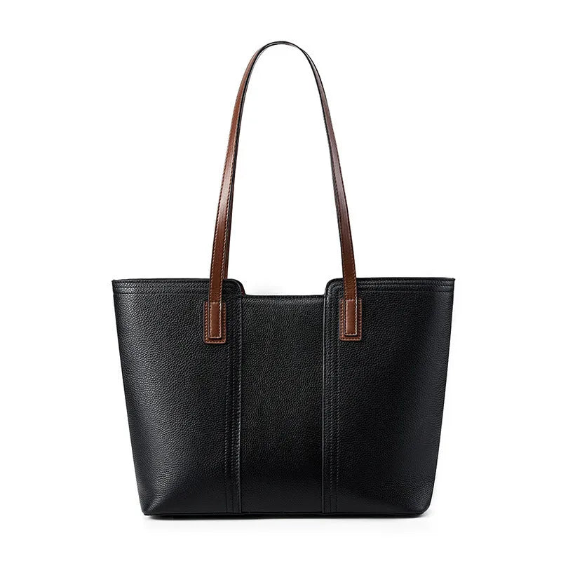 Black genuine leather women's shoulder bag showing internal organiser pockets and crossbody strap