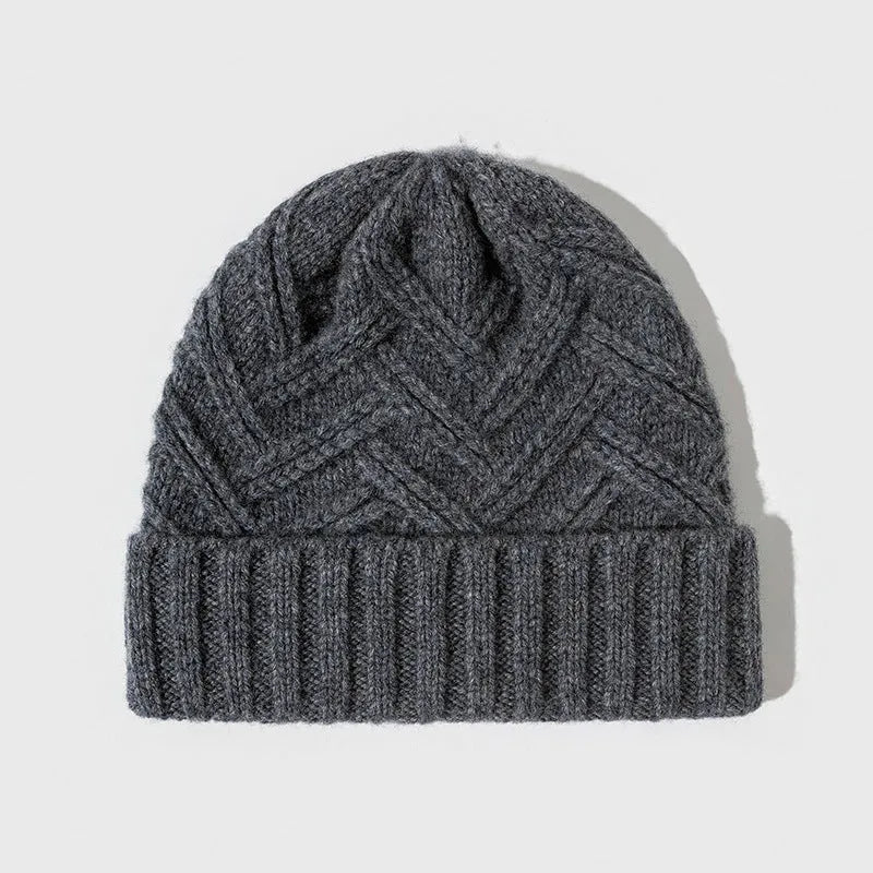 Women's wool knitted dome crown winter hat shown in multiple colour options including ivory white, khaki, and obsidian black.