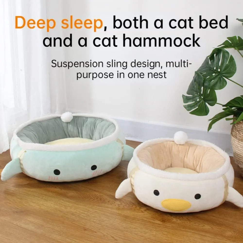 Green dinosaur-shaped cat bed shown both flat and hanging as a hammock for small cats.