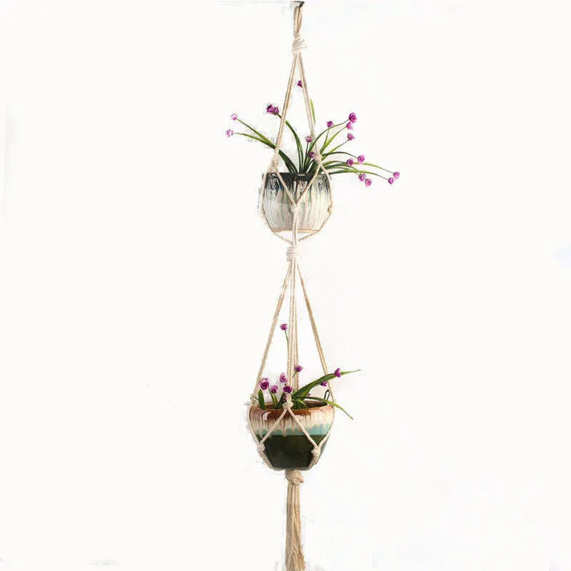 Woven wire and cotton rope macrame plant hanger in a rustic style, shown as a hanging basin.