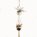 Woven wire and cotton rope macrame plant hanger in a rustic style, shown as a hanging basin.