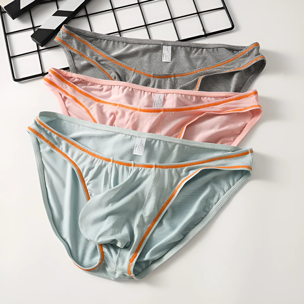 Men's ice silk modal hip-lift underwear shown in dark grey, colourful blue, pink, sky blue, and yellow green.