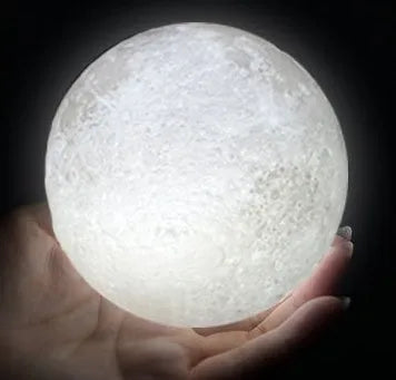 3D-printed white moon lamp on wooden stand with touch-sensitive metal ring base