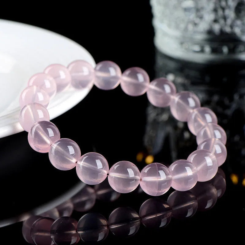 Natural starlight crystal round beads women's bracelet in pink with polished finish and multiple bead size options