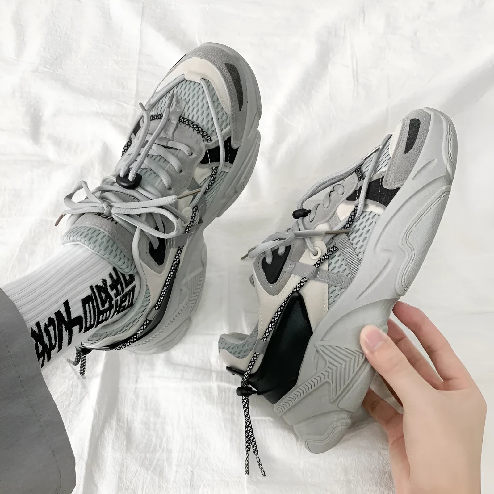 Men's Korean style white platform dad shoes with lace-up front and mesh lining.