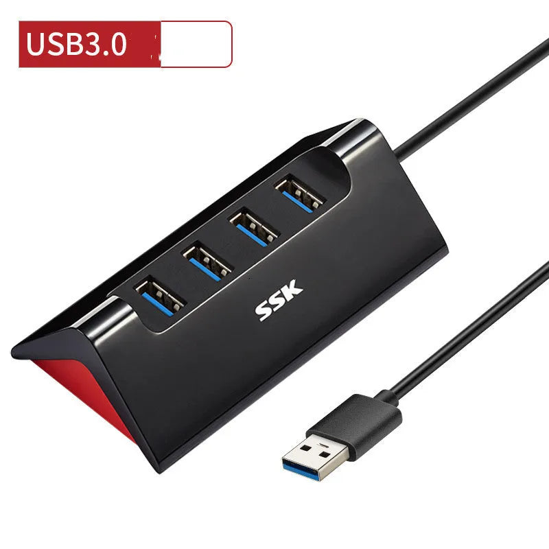 Black ABS plastic USB expansion dock with four ports and a Micro USB power connection.