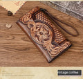 Women's brown embossed floral pattern tri-fold leather wallet showing open compartments