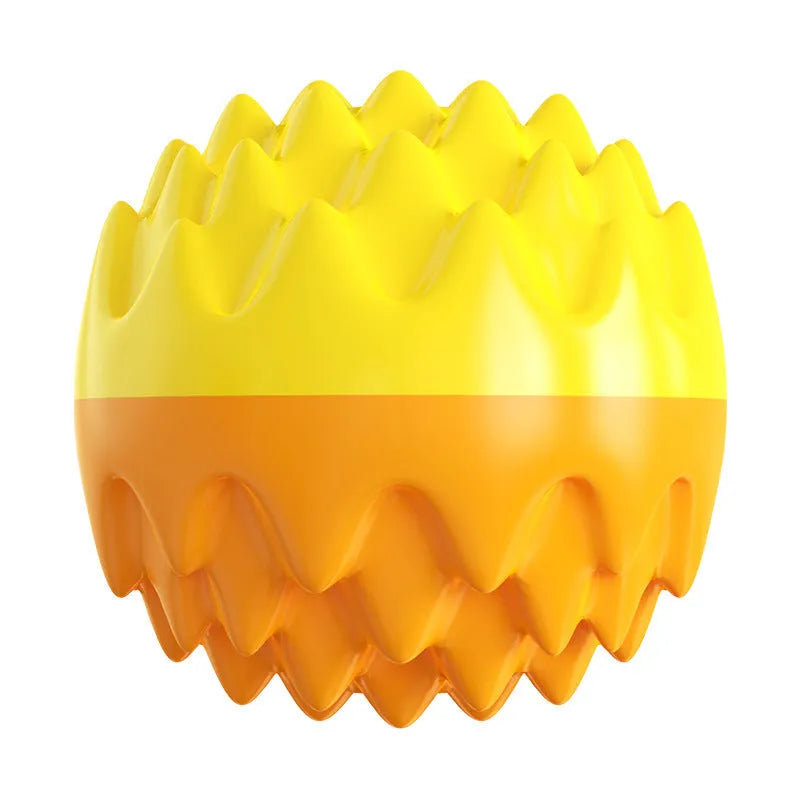 Blue and orange rubber dog ball with spiky texture for dental cleaning and a squeaker inside.