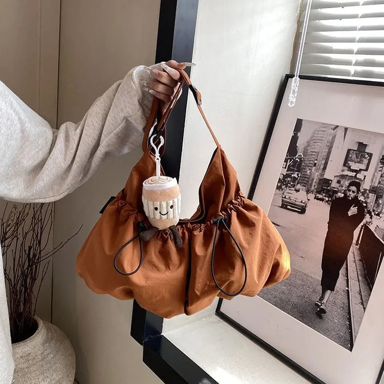 Ultra-light pleated crossbody student cloth bag in beige with split pocket and strap
