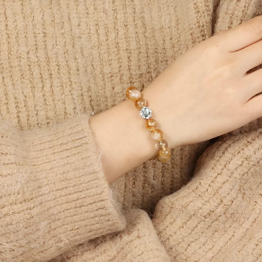 Citrine crystal bracelet with 10mm spherical beads on wrist