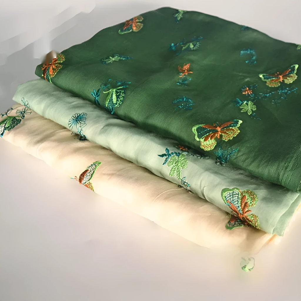 Pure ramie Hanfu embroidery fabric in beige, green, and dark green colours showing 140cm width