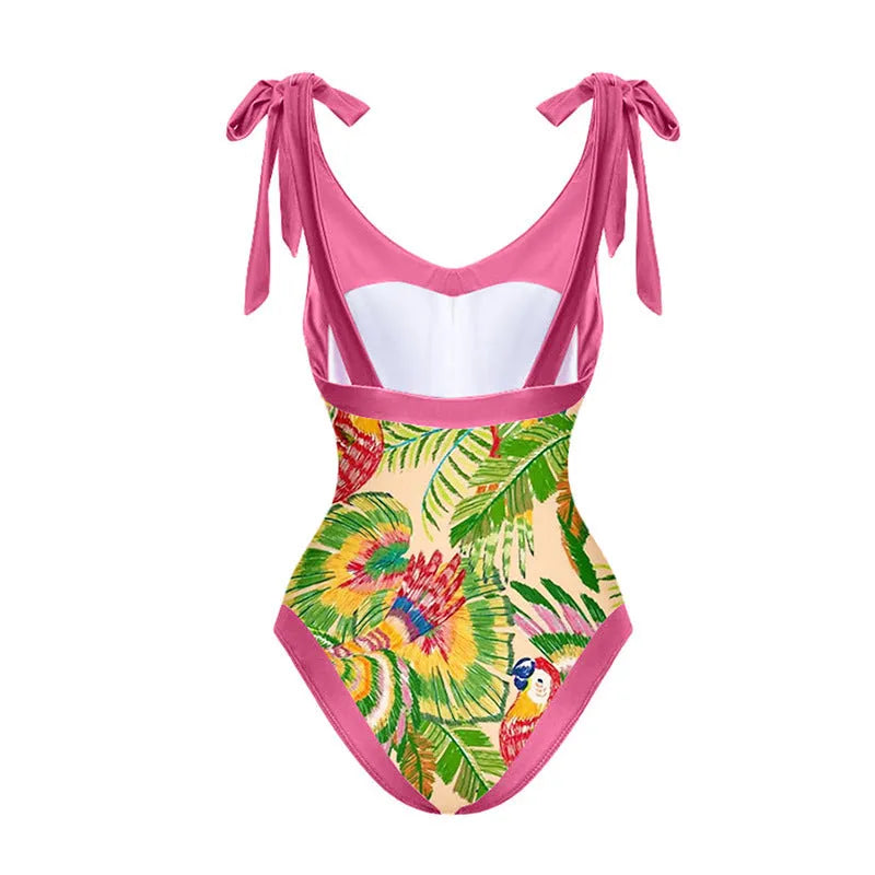 Retro pink floral print women's one-piece swimsuit with a V-neck, covered belly, and thin skirt.