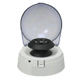 Mini laboratory centrifuge machine with compact 157x170x120mm dimensions on a benchtop.