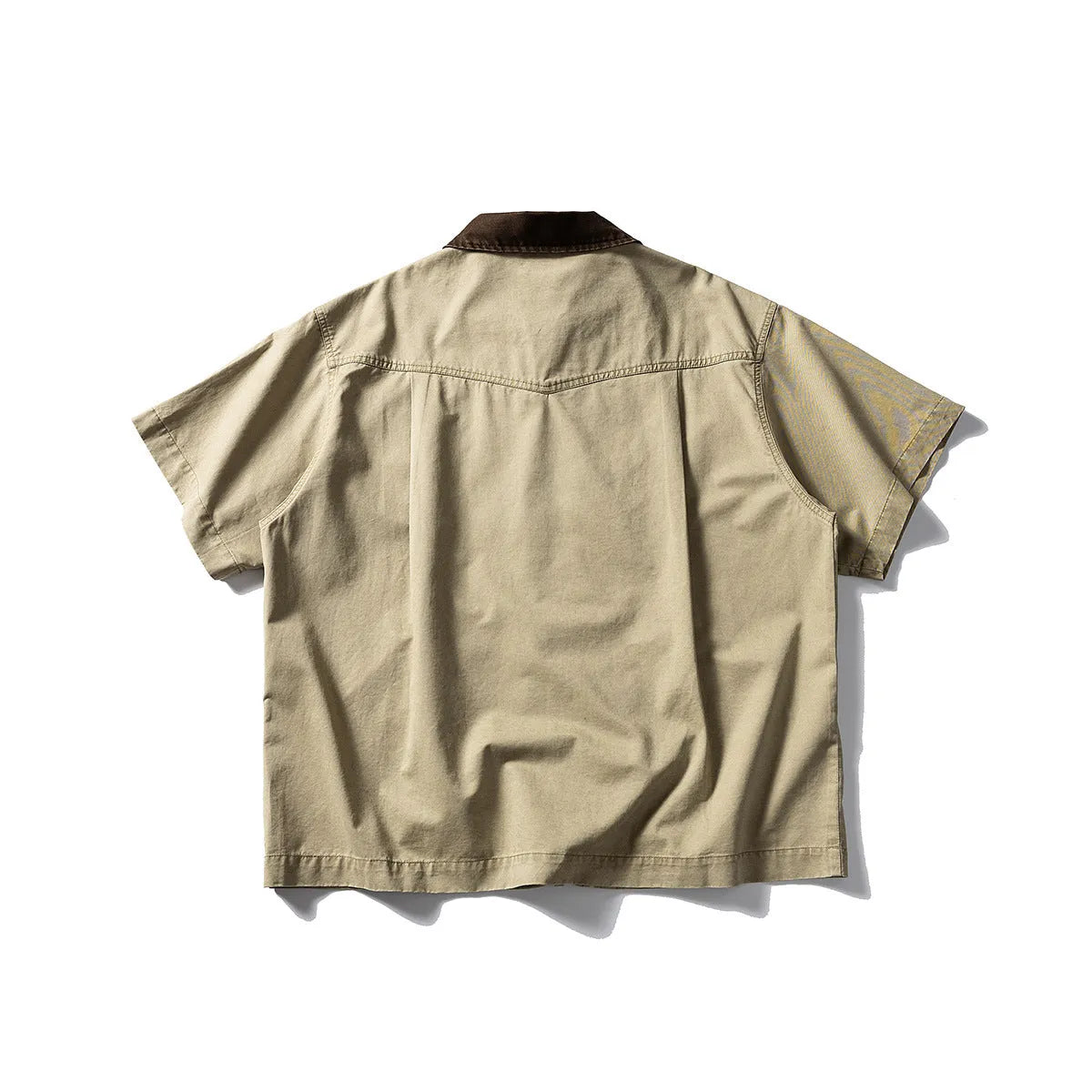 Khaki and grey washed cotton short-sleeved overalls shirt with a loose cardigan fit.