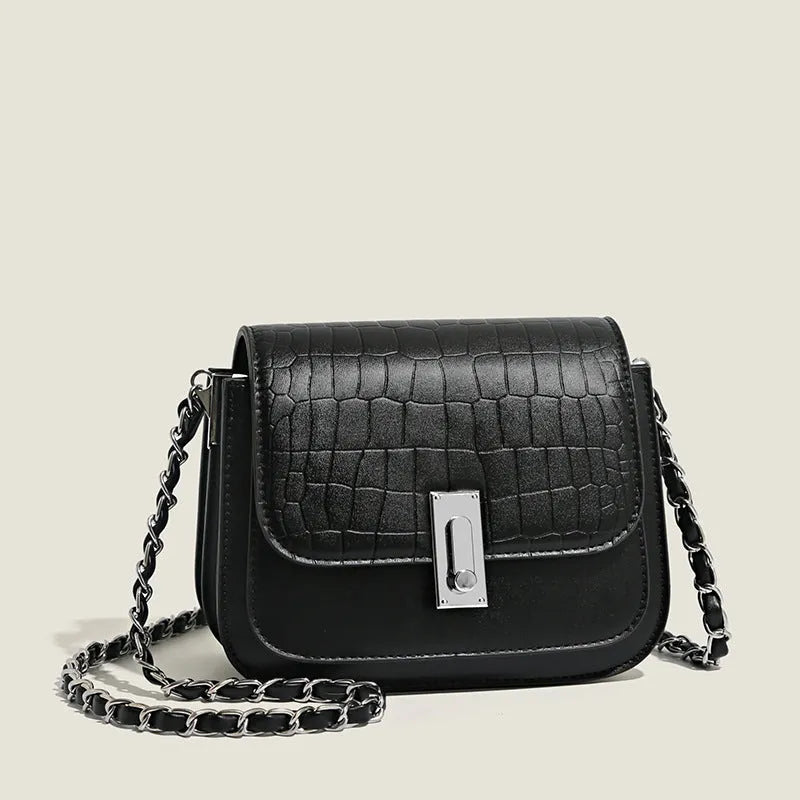 Women's black PU leather crossbody shoulder bag showing horizontal square shape and outer sandwich pocket
