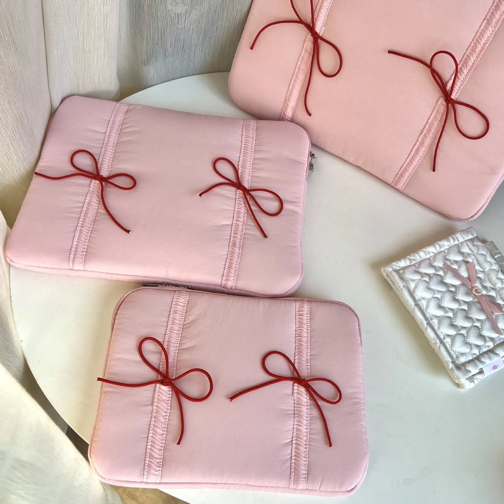 Polyester tablet PC bag with elastic lace bow closure in pink, size 13-14 inches
