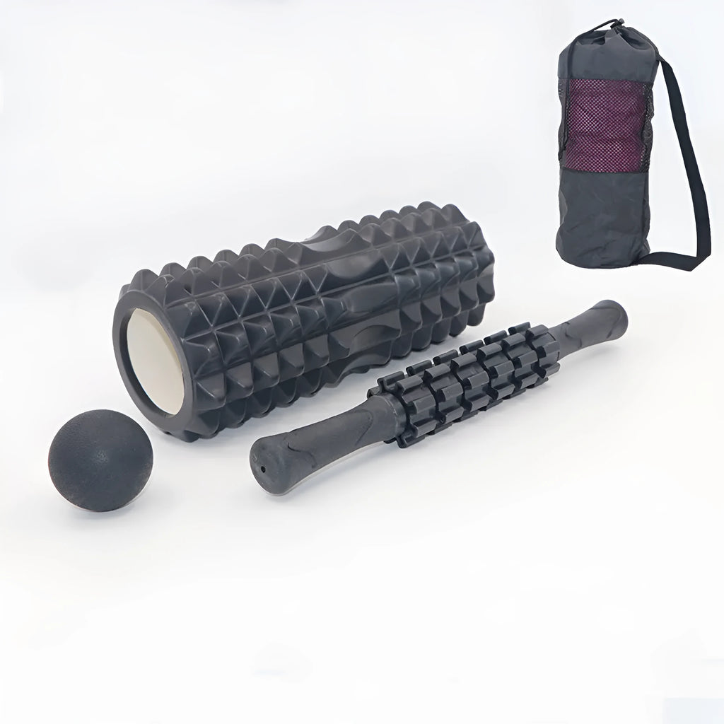 Black handheld foam massage roller bar with six white textured gear pieces on a 33cm shaft.