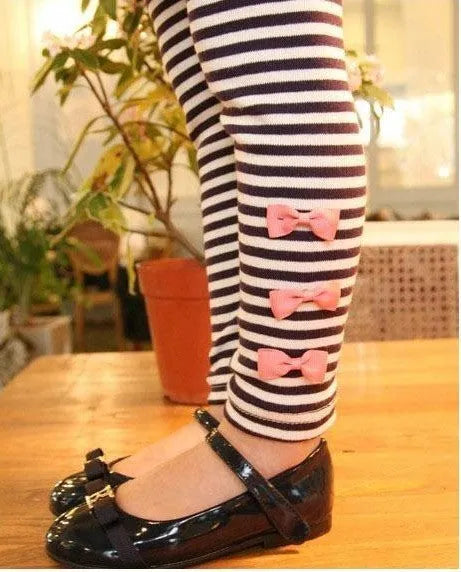 Pink cotton girls' clothing set showing matching top and bottom, for sizes 110cm to 140cm.