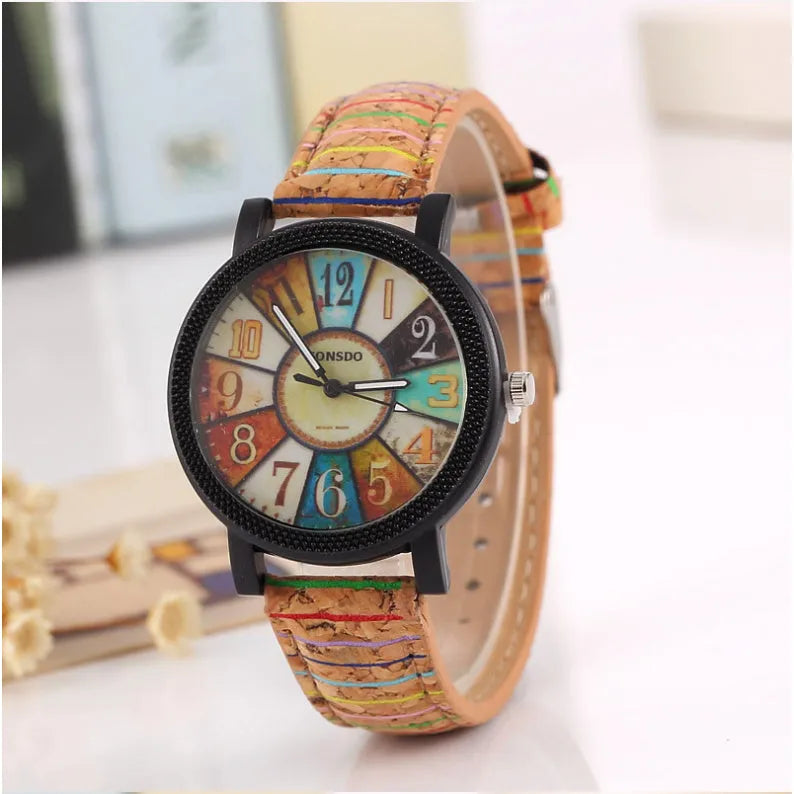 Casual women's wrist watch with leather strap showing 37mm round dial and stainless steel buckle