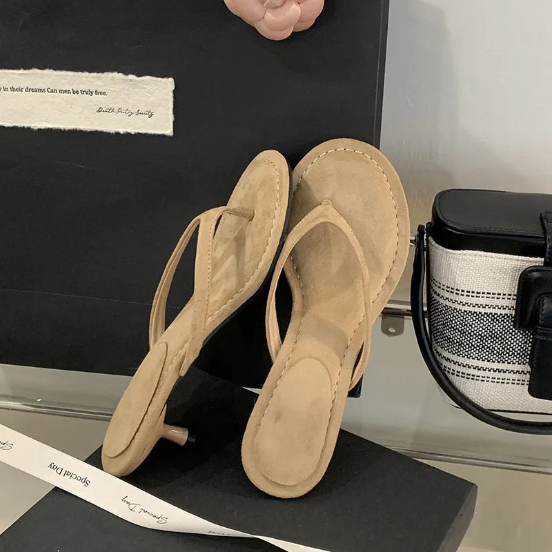 Women's stiletto flip-flop sandals in black or camel with round toe and open-toe design