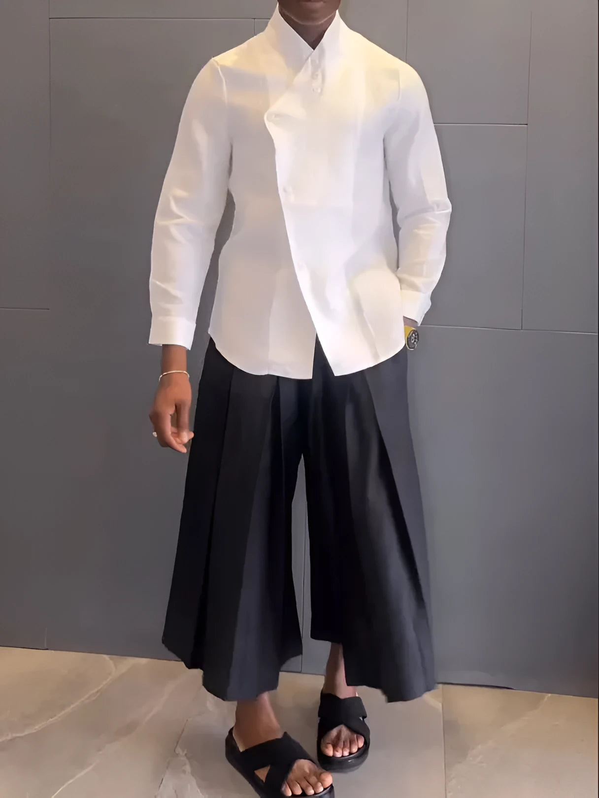 White asymmetric-front long sleeve shirt with black pleated trousers casual set