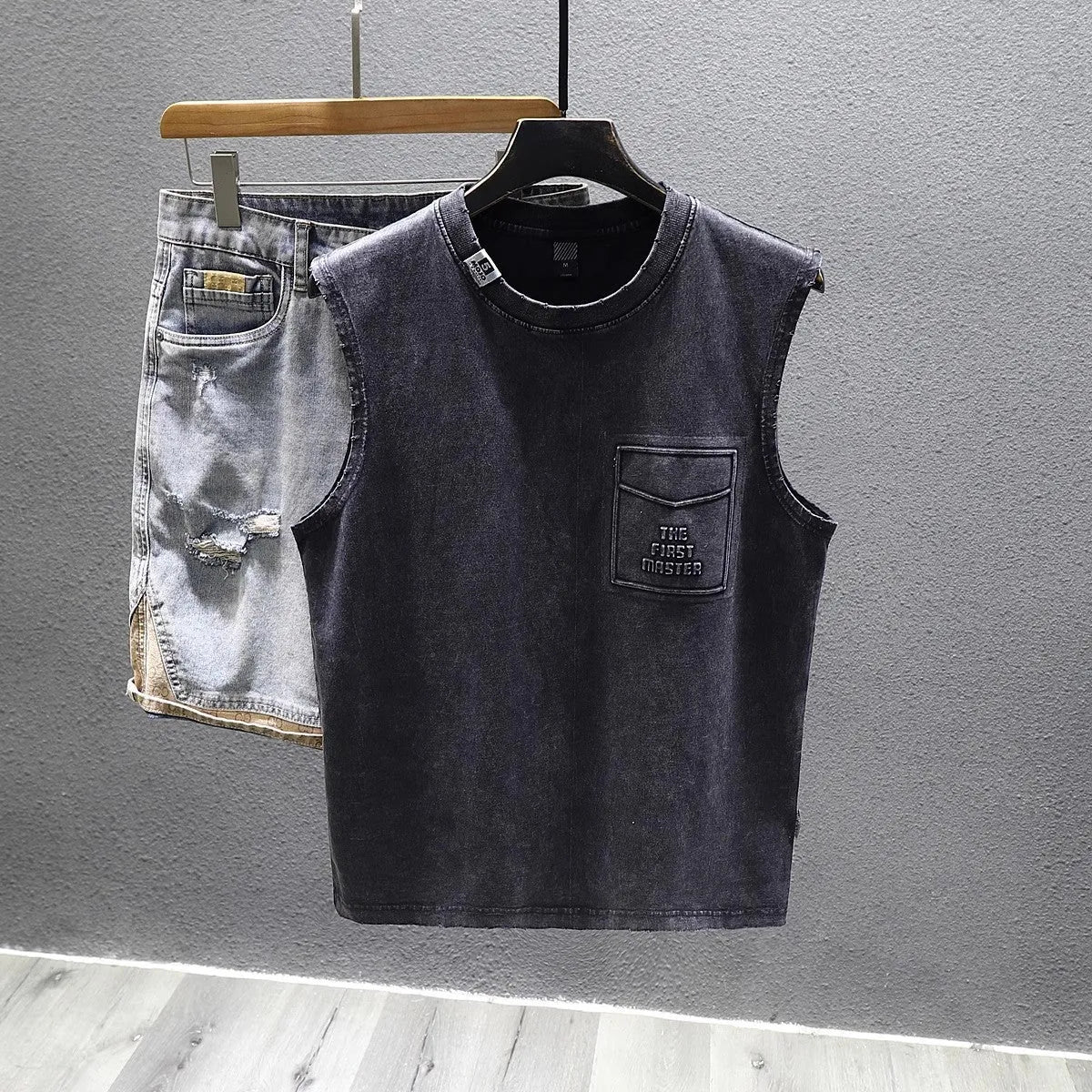 Black and white cotton sleeveless t-shirt with loose fit and straight hem design