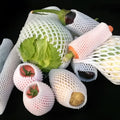 White foam fruit net cover shown in various sizes for protective wrapping.